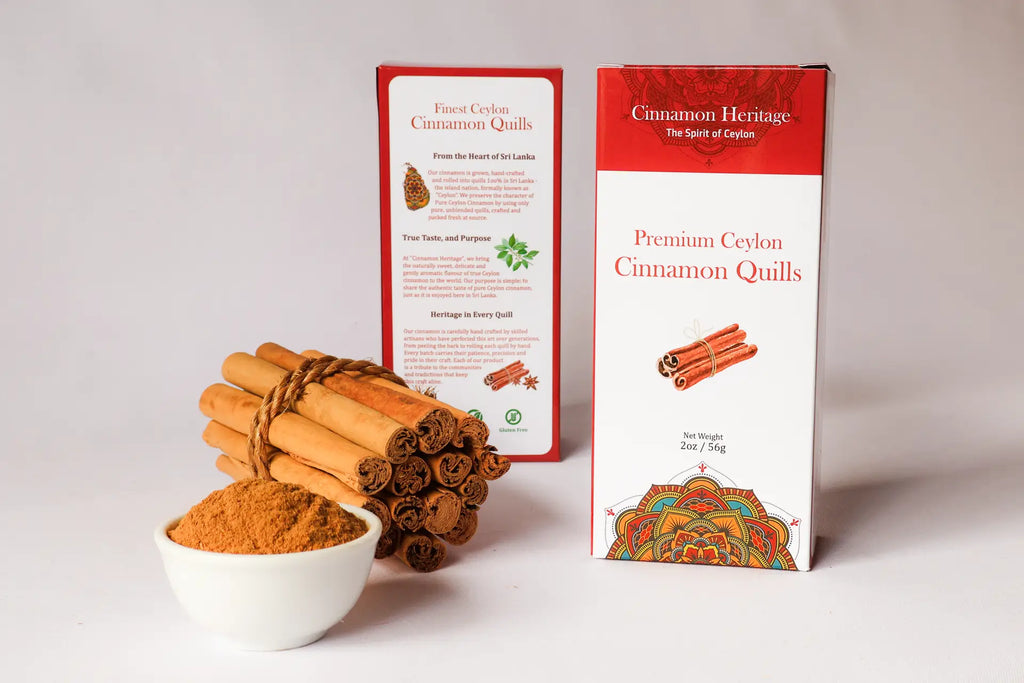 Ceylon Cinnamon quills, ground cinnamon, and a box of Cinnamon Heritage cinnamon quills on a white background